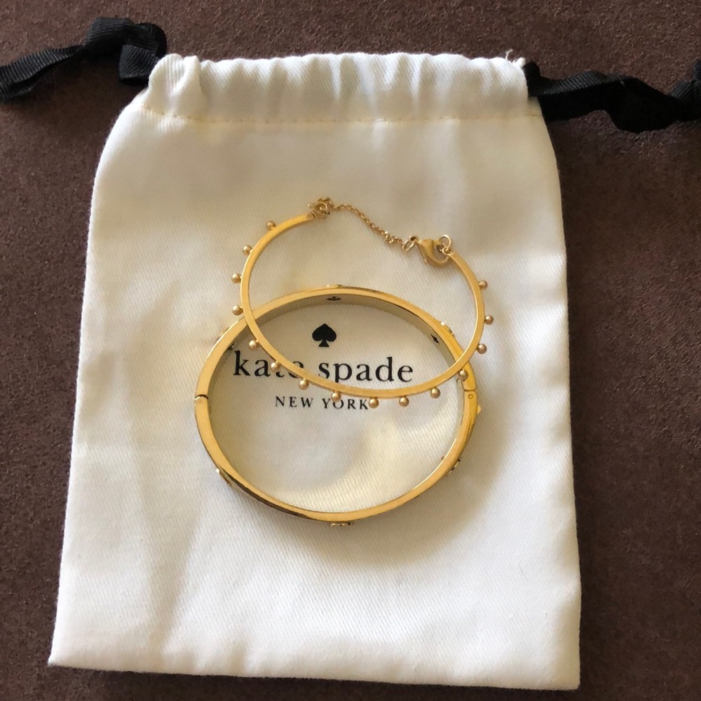 Kate Spade 2 goldtone bangles